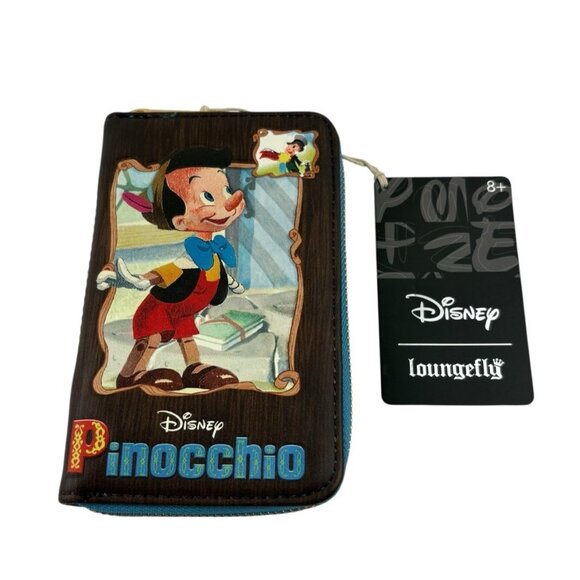 *New Loungefly Disney Pinocchio Classic Story Book Zip Around Wallet NWT - Picture 1 of 6